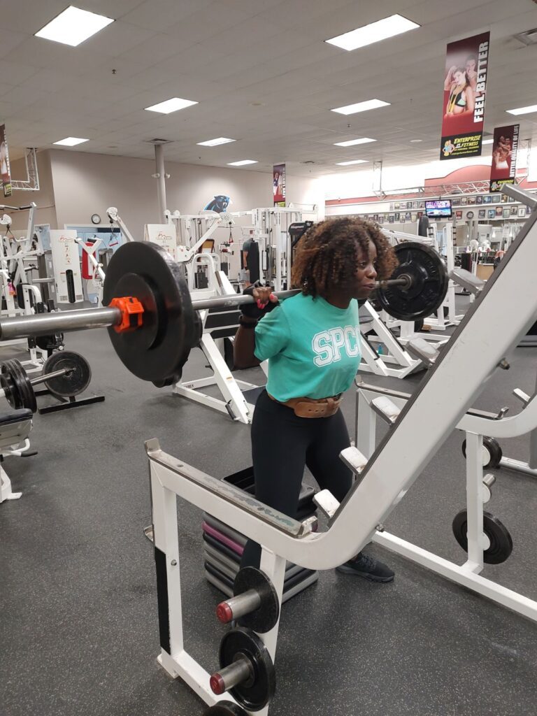 A woman lifting weights.
