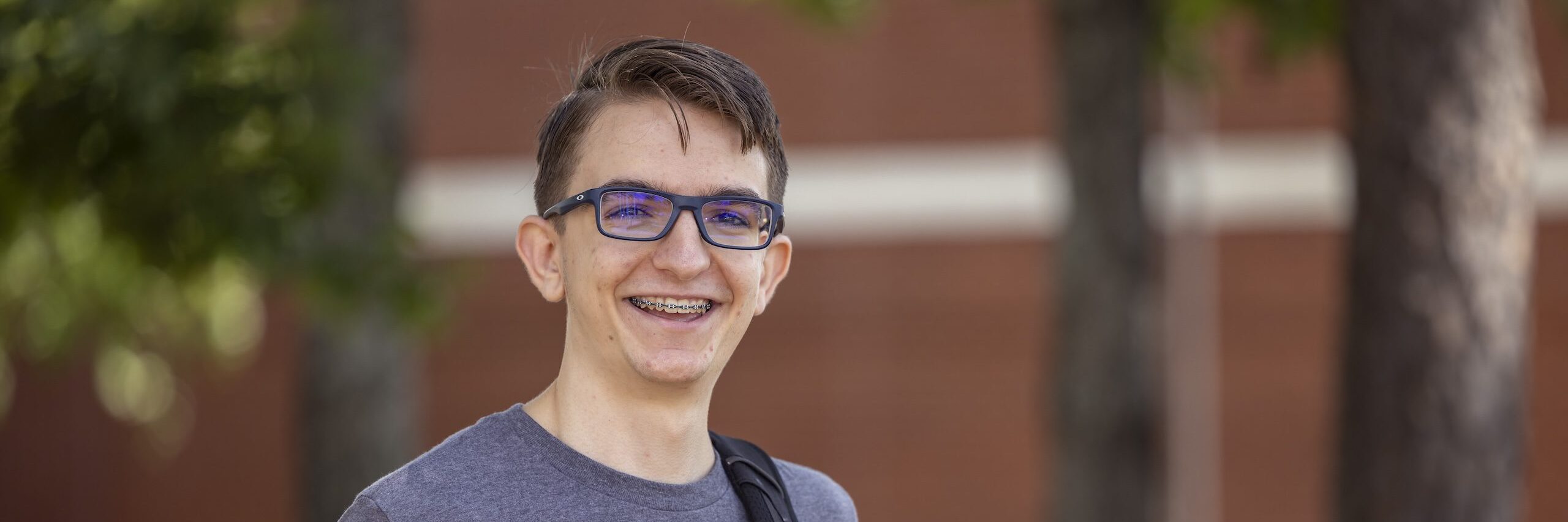Photo of a male student looking at the camera.